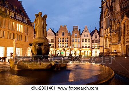 Lamberti fiuntain and Gabled houses on Prinzipalmarkt street at night, Münster, North Rhine-Westphalia, Germany, Europe. View Large Photo Image Stock Image - Lamberti fiuntain and Gabled houses on Prinzipalmarkt street at night, Münster, North Rhine-Westphalia, Germany, Europe.. Fotosearch