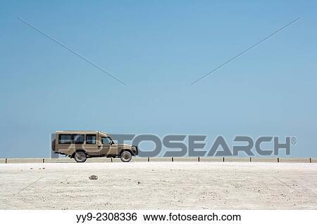 Land Cruiser in Etosha Pan - Etosha National Park - Namibia, Africa. View Large Photo Image Stock Photograph - Land Cruiser in Etosha Pan - Etosha National Park - Namibia, Africa.. Fotosearch