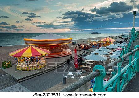 Late summer evening on Brighton seafront, East Sussex, England. View Large Photo Image Stock Image - Late summer evening on Brighton seafront, East Sussex, England.. Fotosearch