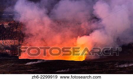 Stock Photo - Lava steam vent glowing at night in the Halemaumau Crater, Hawaii Volcanoes National Park, Hawaii USA.. Fotosearch