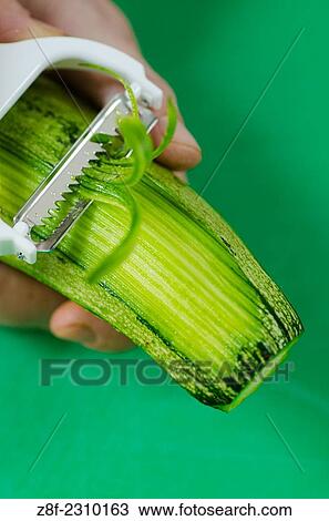 macro shot of a zucchini being peeled. View Large Photo Image Stock Image - macro shot of a zucchini being peeled.. Fotosearch
