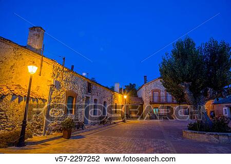 Stock Image - Main Square, night view. Sotosalbos, Segovia province, Castilla Leon, Spain.. Fotosearch