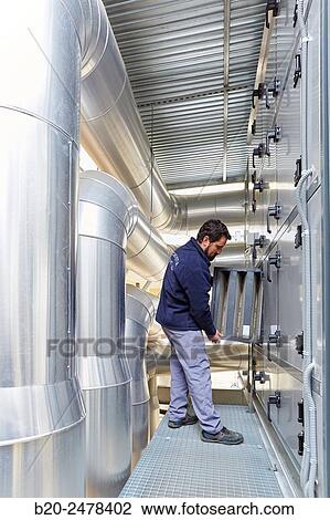 Maintenance worker, Installation of air conditioning, Ventilation air filters of the operating rooms, Hospital Donostia, San Sebastian, Gipuzkoa, Basque Country, Spain View Large Photo Image Stock Image - Maintenance worker, Installation of air conditioning, Ventilation air filters of the operating rooms, Hospital Donostia, San Sebastian, Gipuzkoa, Basque Country, Spain. Fotosearch