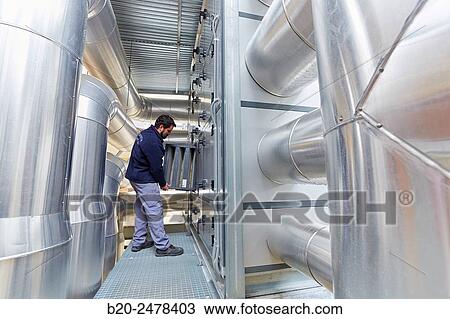 Maintenance worker, Installation of air conditioning, Ventilation air filters of the operating rooms, Hospital Donostia, San Sebastian, Gipuzkoa, Basque Country, Spain View Large Photo Image Stock Image - Maintenance worker, Installation of air conditioning, Ventilation air filters of the operating rooms, Hospital Donostia, San Sebastian, Gipuzkoa, Basque Country, Spain. Fotosearch