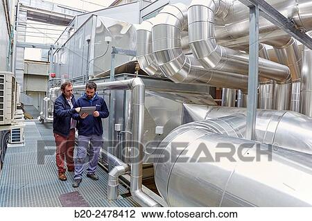 Maintenance worker, Installation of air conditioning, Ventilation air filters of the operating rooms, Hospital Donostia, San Sebastian, Gipuzkoa, Basque Country, Spain View Large Photo Image Stock Image - Maintenance worker, Installation of air conditioning, Ventilation air filters of the operating rooms, Hospital Donostia, San Sebastian, Gipuzkoa, Basque Country, Spain. Fotosearch