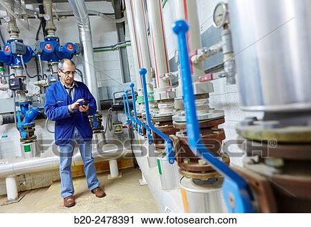 Maintenance worker, Installation of water pumps, Hospital Donostia, San Sebastian, Gipuzkoa, Basque Country, Spain View Large Photo Image Stock Image - Maintenance worker, Installation of water pumps, Hospital Donostia, San Sebastian, Gipuzkoa, Basque Country, Spain. Fotosearch