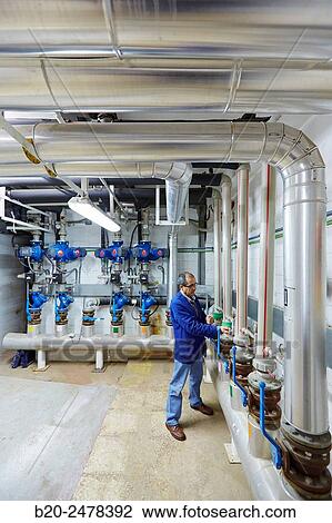 Maintenance worker, Installation of water pumps, Hospital Donostia, San Sebastian, Gipuzkoa, Basque Country, Spain View Large Photo Image Stock Image - Maintenance worker, Installation of water pumps, Hospital Donostia, San Sebastian, Gipuzkoa, Basque Country, Spain. Fotosearch