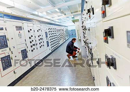 Stock Photography - Maintenance worker, Overview Low Voltage, Wiring, Electrical panels, Hospital Donostia, San Sebastian, Gipuzkoa, Basque Country, Spain. Fotosearch