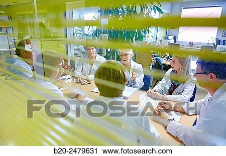 Stock Image - Meeting of health professionals, Human Resources Department, Hospital Donostia, San Sebastian, Gipuzkoa, Basque Country, Spain. Fotosearch