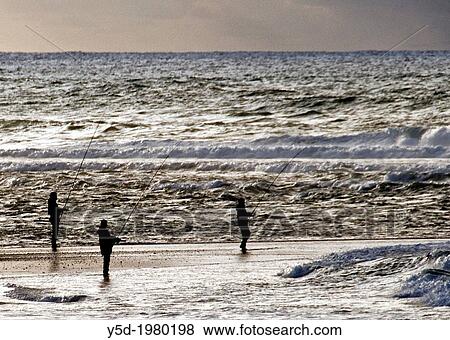 Men fishing with rods in Atlantic Ocean, Foz do Arelho, Portugal View Large Photo Image Stock Photo - Men fishing with rods in Atlantic Ocean, Foz do Arelho, Portugal. Fotosearch