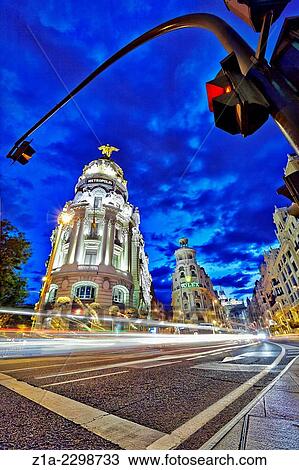 Stock Image - Metropolis building and Gran Via street at twilight. Madrid, Spain.. Fotosearch