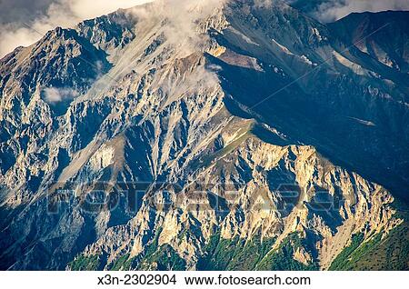 Mountain face of Chucach Mountains near Palmer, Alaska. View Large Photo Image Picture - Mountain face of Chucach Mountains near Palmer, Alaska.. Fotosearch