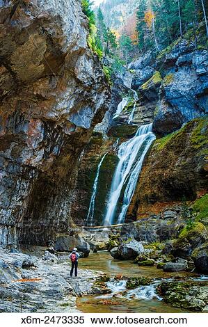 Stock Photography - Narrow waterfall. Ordesa Valley. Ordesa National Park. Pyrenees, Huesca, Spain, Europe.. Fotosearch