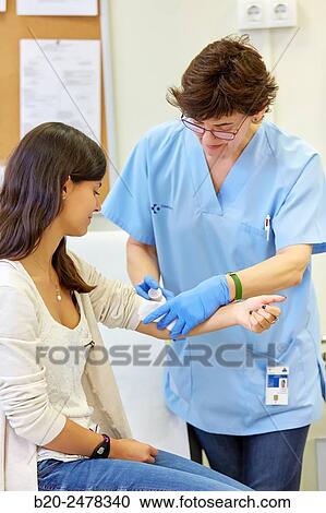 Nurse performing cure, Nursing room, Medical consultation, Ambulatory Lezo, Gipuzkoa, Basque Country, Spain View Large Photo Image Stock Image - Nurse performing cure, Nursing room, Medical consultation, Ambulatory Lezo, Gipuzkoa, Basque Country, Spain. Fotosearch
