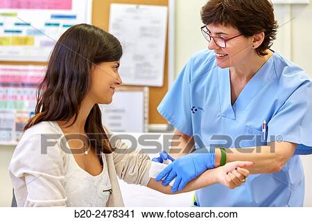 Nurse performing cure, Nursing room, Medical consultation, Ambulatory Lezo, Gipuzkoa, Basque Country, Spain View Large Photo Image Stock Image - Nurse performing cure, Nursing room, Medical consultation, Ambulatory Lezo, Gipuzkoa, Basque Country, Spain. Fotosearch