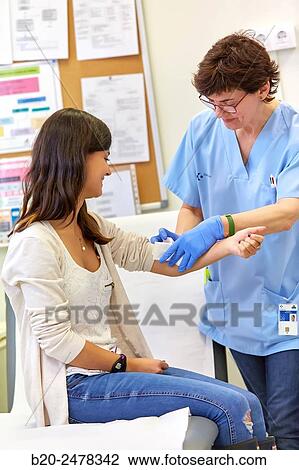 Nurse performing cure, Nursing room, Medical consultation, Ambulatory Lezo, Gipuzkoa, Basque Country, Spain View Large Photo Image Stock Image - Nurse performing cure, Nursing room, Medical consultation, Ambulatory Lezo, Gipuzkoa, Basque Country, Spain. Fotosearch
