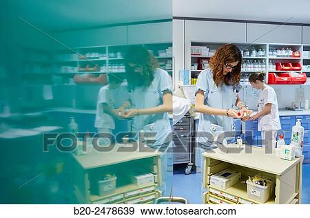 Nurse preparing medication, Nursing control, Plant hospitalization, Hospital Donostia, San Sebastian, Gipuzkoa, Basque Country, Spain View Large Photo Image Stock Photo - Nurse preparing medication, Nursing control, Plant hospitalization, Hospital Donostia, San Sebastian, Gipuzkoa, Basque Country, Spain. Fotosearch