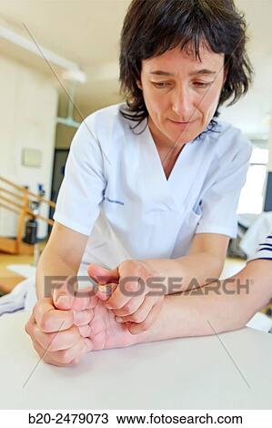 Occupational therapy, physiotherapy, hands: relaxing exercise, hemiplegia, stroke, Rebahilitation, Hospital Donostia, San Sebastian, Gipuzkoa, Basque Country, Spain View Large Photo Image Stock Image - Occupational therapy, physiotherapy, hands: relaxing exercise, hemiplegia, stroke, Rebahilitation, Hospital Donostia, San Sebastian, Gipuzkoa, Basque Country, Spain. Fotosearch