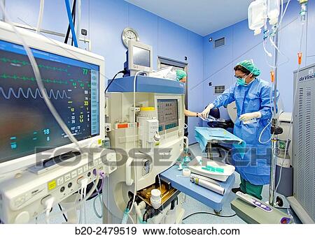 Stock Photo - Operating room, Prostate cancer robotic surgery, Da Vinci surgical robot, Urology, Hospital Donostia, San Sebastian, Gipuzkoa, Basque Country, Spain. Fotosearch
