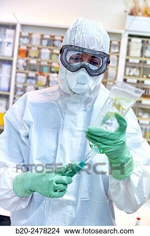Personal protective equipment, protection for the care of patients with infectious diseases (Ebola), Drugs store, Nursing station, Hospital Donostia, San Sebastian, Gipuzkoa, Basque Country, Spain View Large Photo Image Picture - Personal protective equipment, protection for the care of patients with infectious diseases (Ebola), Drugs store, Nursing station, Hospital Donostia, San Sebastian, Gipuzkoa, Basque Country, Spain. Fotosearch