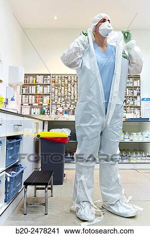 Personal protective equipment, protection for the care of patients with infectious diseases (Ebola), Drugs store, Nursing station, Hospital Donostia, San Sebastian, Gipuzkoa, Basque Country, Spain View Large Photo Image Stock Image - Personal protective equipment, protection for the care of patients with infectious diseases (Ebola), Drugs store, Nursing station, Hospital Donostia, San Sebastian, Gipuzkoa, Basque Country, Spain. Fotosearch