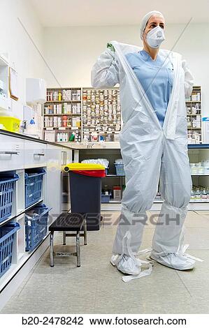 Personal protective equipment, protection for the care of patients with infectious diseases (Ebola), Drugs store, Nursing station, Hospital Donostia, San Sebastian, Gipuzkoa, Basque Country, Spain View Large Photo Image Stock Image - Personal protective equipment, protection for the care of patients with infectious diseases (Ebola), Drugs store, Nursing station, Hospital Donostia, San Sebastian, Gipuzkoa, Basque Country, Spain. Fotosearch