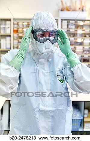 Personal protective equipment, protection for the care of patients with infectious diseases (Ebola), Drugs store, Nursing station, Hospital Donostia, San Sebastian, Gipuzkoa, Basque Country, Spain View Large Photo Image Stock Photo - Personal protective equipment, protection for the care of patients with infectious diseases (Ebola), Drugs store, Nursing station, Hospital Donostia, San Sebastian, Gipuzkoa, Basque Country, Spain. Fotosearch