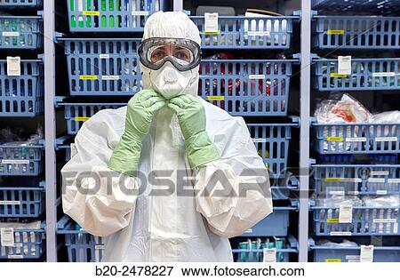 Personal protective equipment, protection for the care of patients with infectious diseases (Ebola), Drugs store, Nursing station, Hospital Donostia, San Sebastian, Gipuzkoa, Basque Country, Spain View Large Photo Image Stock Photo - Personal protective equipment, protection for the care of patients with infectious diseases (Ebola), Drugs store, Nursing station, Hospital Donostia, San Sebastian, Gipuzkoa, Basque Country, Spain. Fotosearch