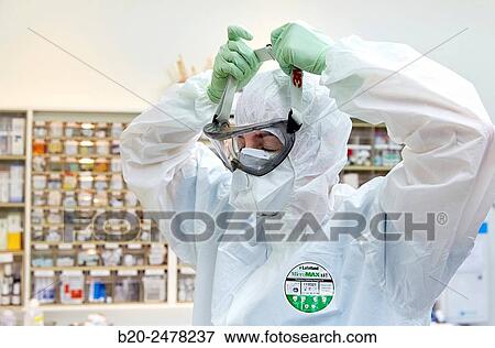 Personal protective equipment, protection for the care of patients with infectious diseases (Ebola), Drugs store, Nursing station, Hospital Donostia, San Sebastian, Gipuzkoa, Basque Country, Spain View Large Photo Image Stock Photo - Personal protective equipment, protection for the care of patients with infectious diseases (Ebola), Drugs store, Nursing station, Hospital Donostia, San Sebastian, Gipuzkoa, Basque Country, Spain. Fotosearch