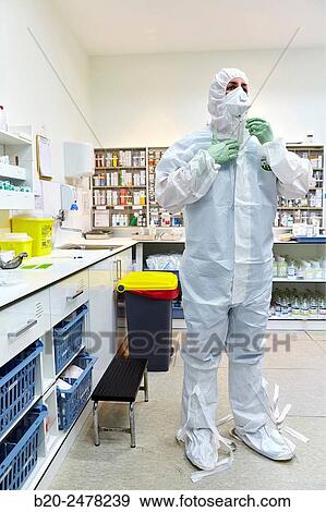 Personal protective equipment, protection for the care of patients with infectious diseases (Ebola), Drugs store, Nursing station, Hospital Donostia, San Sebastian, Gipuzkoa, Basque Country, Spain View Large Photo Image Stock Photo - Personal protective equipment, protection for the care of patients with infectious diseases (Ebola), Drugs store, Nursing station, Hospital Donostia, San Sebastian, Gipuzkoa, Basque Country, Spain. Fotosearch