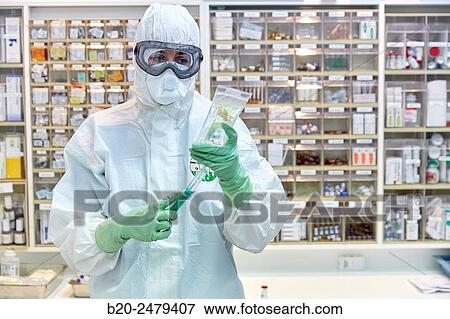Personal protective equipment, protection for the care of patients with infectious diseases (Ebola), Drugs store, Nursing station, Hospital Donostia, San Sebastian, Gipuzkoa, Basque Country, Spain View Large Photo Image Stock Photo - Personal protective equipment, protection for the care of patients with infectious diseases (Ebola), Drugs store, Nursing station, Hospital Donostia, San Sebastian, Gipuzkoa, Basque Country, Spain. Fotosearch