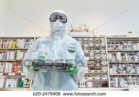 Personal protective equipment, protection for the care of patients with infectious diseases (Ebola), Drugs store, Nursing station, Hospital Donostia, San Sebastian, Gipuzkoa, Basque Country, Spain View Large Photo Image Stock Photo - Personal protective equipment, protection for the care of patients with infectious diseases (Ebola), Drugs store, Nursing station, Hospital Donostia, San Sebastian, Gipuzkoa, Basque Country, Spain. Fotosearch