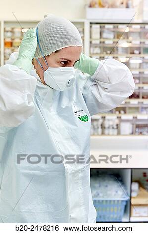 Personal protective equipment, protection for the care of patients with infectious diseases (Ebola), Drugs store, Nursing station, Hospital Donostia, San Sebastian, Gipuzkoa, Basque Country, Spain View Large Photo Image Stock Photograph - Personal protective equipment, protection for the care of patients with infectious diseases (Ebola), Drugs store, Nursing station, Hospital Donostia, San Sebastian, Gipuzkoa, Basque Country, Spain. Fotosearch