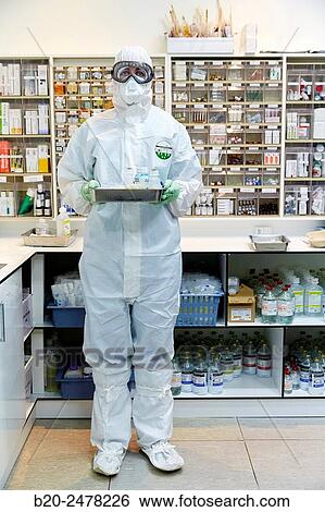 Personal protective equipment, protection for the care of patients with infectious diseases (Ebola), Drugs store, Nursing station, Hospital Donostia, San Sebastian, Gipuzkoa, Basque Country, Spain View Large Photo Image Stock Photograph - Personal protective equipment, protection for the care of patients with infectious diseases (Ebola), Drugs store, Nursing station, Hospital Donostia, San Sebastian, Gipuzkoa, Basque Country, Spain. Fotosearch