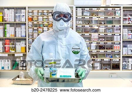 Personal protective equipment, protection for the care of patients with infectious diseases (Ebola), Drugs store, Nursing station, Hospital Donostia, San Sebastian, Gipuzkoa, Basque Country, Spain View Large Photo Image Stock Photography - Personal protective equipment, protection for the care of patients with infectious diseases (Ebola), Drugs store, Nursing station, Hospital Donostia, San Sebastian, Gipuzkoa, Basque Country, Spain. Fotosearch