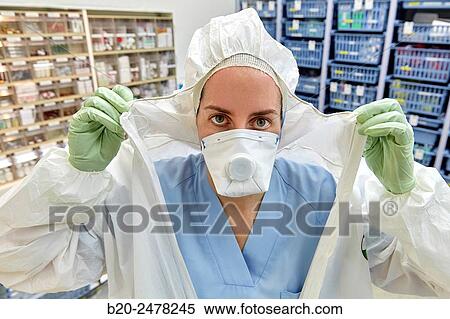 Personal protective equipment, protection for the care of patients with infectious diseases (Ebola), Drugs store, Nursing station, Hospital Donostia, San Sebastian, Gipuzkoa, Basque Country, Spain View Large Photo Image Stock Photography - Personal protective equipment, protection for the care of patients with infectious diseases (Ebola), Drugs store, Nursing station, Hospital Donostia, San Sebastian, Gipuzkoa, Basque Country, Spain. Fotosearch