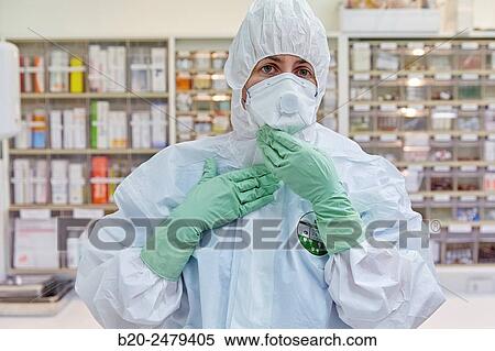 Personal protective equipment, protection for the care of patients with infectious diseases (Ebola), Drugs store, Nursing station, Hospital Donostia, San Sebastian, Gipuzkoa, Basque Country, Spain View Large Photo Image Stock Photography - Personal protective equipment, protection for the care of patients with infectious diseases (Ebola), Drugs store, Nursing station, Hospital Donostia, San Sebastian, Gipuzkoa, Basque Country, Spain. Fotosearch