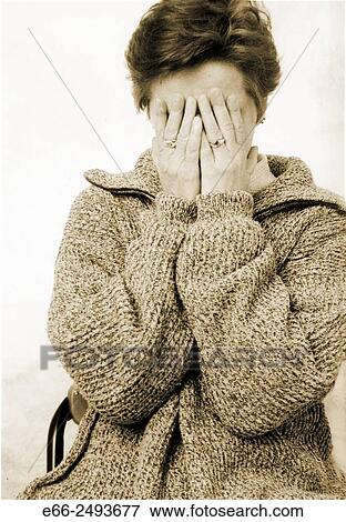 Portrait of woman with hands covering face. View Large Photo Image Stock Photo - Portrait of woman with hands covering face.. Fotosearch