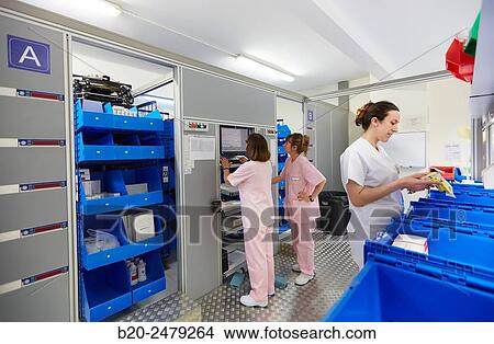 Picture - Preparation of drugs, Chaotic storage, Pharmacy, Hospital Donostia, San Sebastian, Gipuzkoa, Basque Country, Spain. Fotosearch