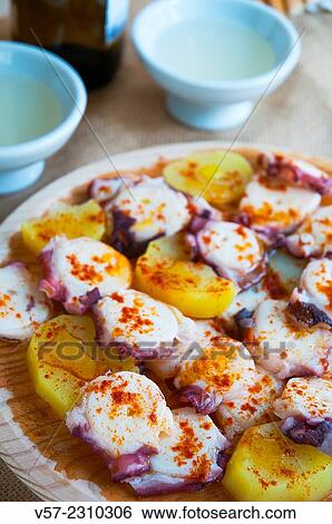 Pulpo a Feira and Ribeiro wine, close view. Galicia, Spain. View Large Photo Image Stock Photograph - Pulpo a Feira and Ribeiro wine, close view. Galicia, Spain.. Fotosearch