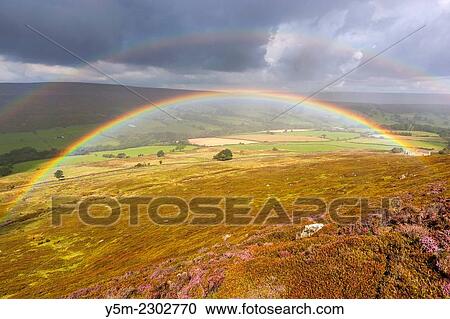 Rainbow over moors near Westerdale, North York Moors National Park, North Yorkshire, England, United Kingdom, Europe. View Large Photo Image Stock Image - Rainbow over moors near Westerdale, North York Moors National Park, North Yorkshire, England, United Kingdom, Europe.. Fotosearch