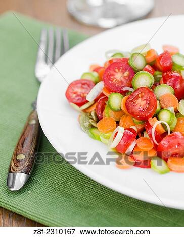 raw vegetable salad in white plate. View Large Photo Image Stock Photo - raw vegetable salad in white plate.. Fotosearch