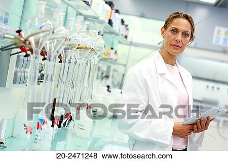 Stock Photo - Researcher. Elimination of interference with resin to treat sea water and heavy metals analysis, Laboratory, Research on building materials, Tecnalia Research & Innovation, Zamudio, Bizkaia, Basque Country, Spain. Fotosearch
