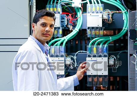 Stock Image - Researcher. Low Voltage Micro Network. Testing and Certificates Services for Smart Grids and Smart meters. Certification of Power Electronics Equipment. Technological Services to Industry. Tecnalia Research & innovation, Bizkaia, Basque Country, Spain.. Fotosearch