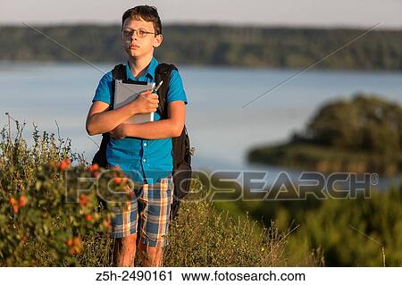 Russia. Belgorod region. Solomino village. The boy goes to the village school. View Large Photo Image Stock Image - Russia. Belgorod region. Solomino village. The boy goes to the village school.. Fotosearch