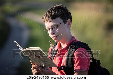 Stock Photography - Russia. Belgorod region. Solomino village. The boy goes to the village school.. Fotosearch