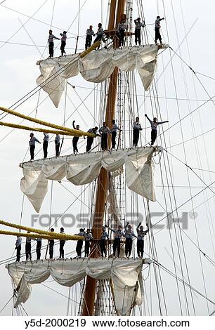Stock Photo - sailors on Cuauhtémoc - Mexican sailing vessel - three-masted barque, the crew - 109 sailors, Armada 2013 - cruise of biggest sailing vessels in the world on Seine river from Rouen to Atlantic Ocean, France, Europe.. Fotosearch