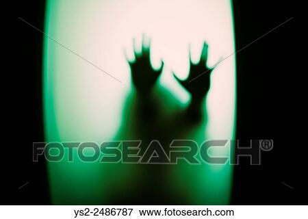 Stock Photo - Silhouette of little child holding up hands. Conceptual image of childhood fears, abuse and safety of children.. Fotosearch