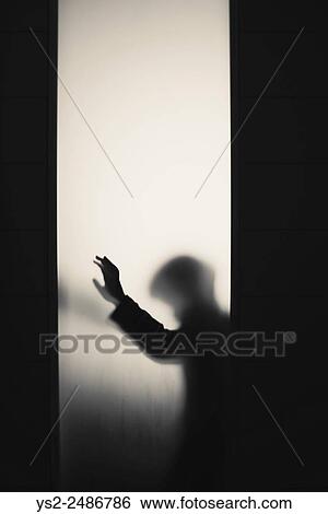Silhouette of little child with raised arm. Conceptual image of childhood fears, abuse and safety of children. View Large Photo Image Stock Photograph - Silhouette of little child with raised arm. Conceptual image of childhood fears, abuse and safety of children.. Fotosearch