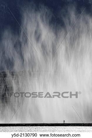 Single person taking picture of famous fountain on Geneva Lake Jet d´Eau, Geneva, Switzerland. View Large Photo Image Stock Image - Single person taking picture of famous fountain on Geneva Lake Jet d´Eau, Geneva, Switzerland.. Fotosearch